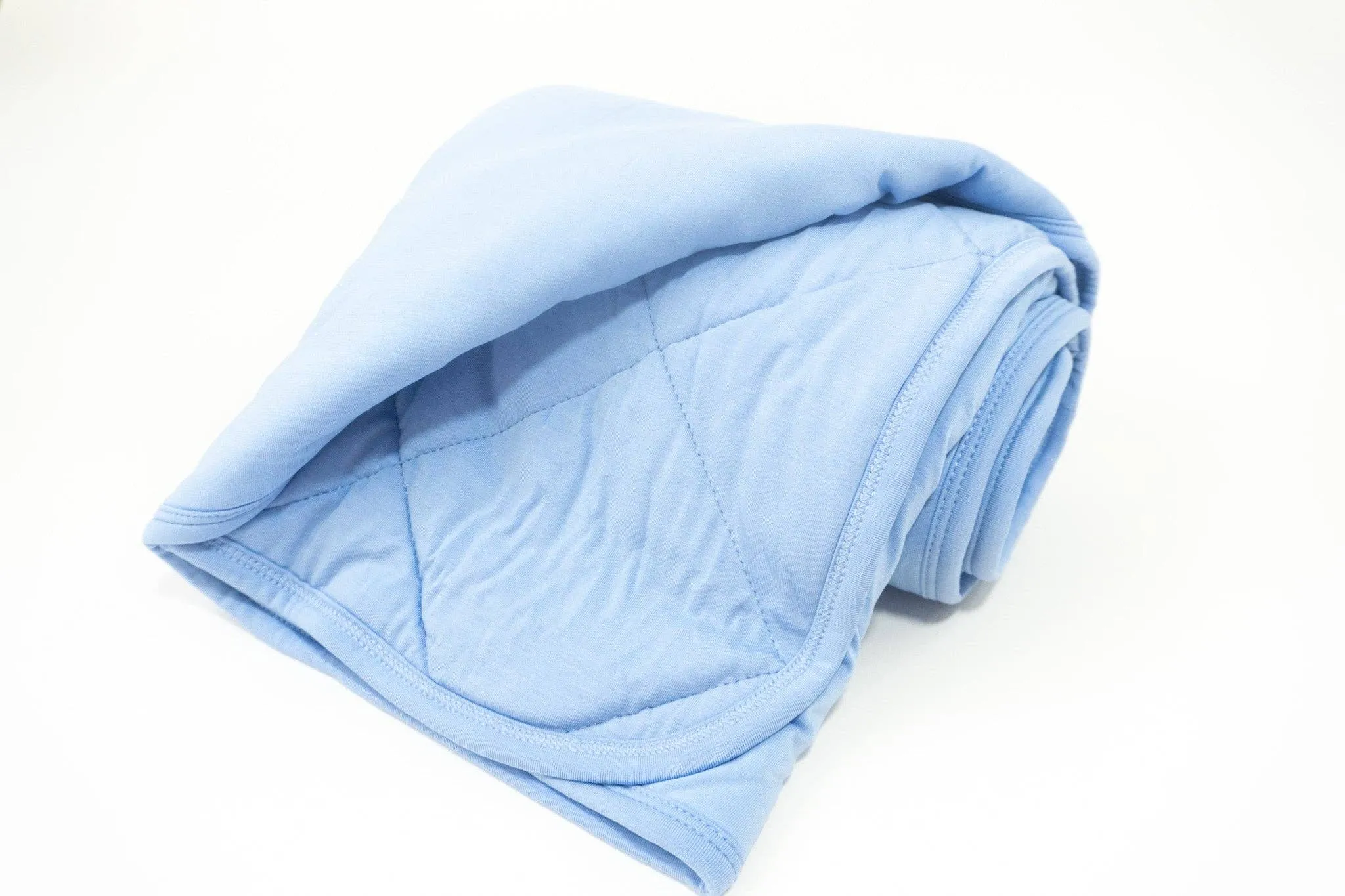 Floret Quilted Blanket | Arctic
